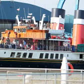Amazing, stunning, emotional - the large crowd that stood on Kingston Beach to watch the world’s last seagoing paddle steamer make its inaugural visit to Shoreham was visibly moved by the sight of the Waverley making its way in and out of the harbour on Wednesday, September 13.