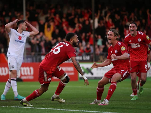 Jay Williams celebrates scoring his team's second goal during the Sky Bet League Two Play-Off Semi-Final 1st Leg match between Crawley Town and Milton Keynes Dons at Broadfield Stadium on May 07, 2024 in Crawley, England. (Photo by Steve Bardens/Getty Images) (Photo by Steve Bardens/Getty Images)