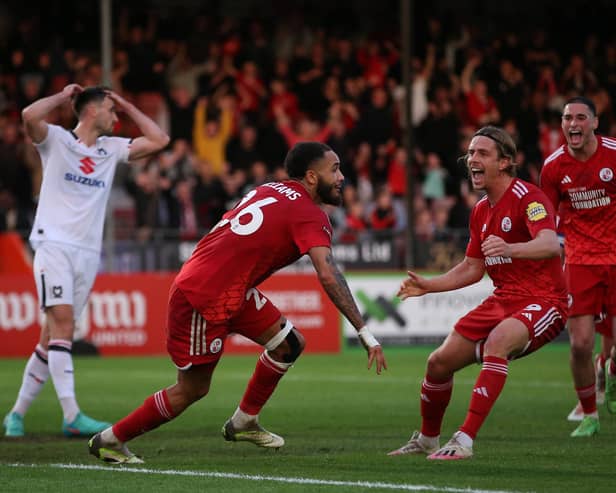 Jay Williams celebrates scoring his team's second goal during the Sky Bet League Two Play-Off Semi-Final 1st Leg match between Crawley Town and Milton Keynes Dons at Broadfield Stadium on May 07, 2024 in Crawley, England. (Photo by Steve Bardens/Getty Images) (Photo by Steve Bardens/Getty Images)