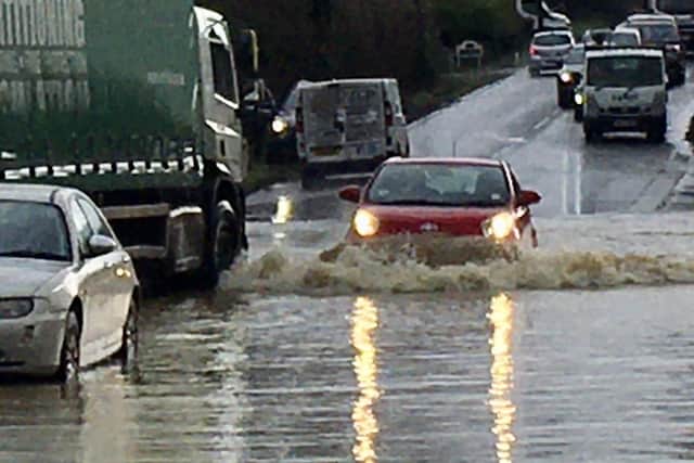 Flooding on the A21 at Sedlescombe. Photo: John Gotts.