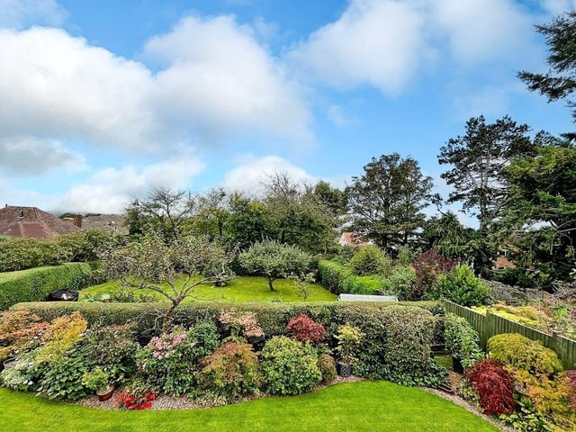 This three-bedroom, detached house with a stunning south-facing garden has come on the market with Graham Butt priced at £695,000