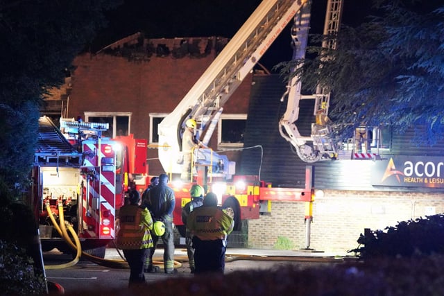 Firefighters at the scene at Acorns Health and Leisure Centre in Crawley. Picture: Sussex News and Pictures