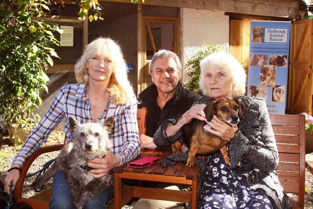 Cliff and Laura Santini and Laura's mother Sylvia Bradbury at Holbrook Animal Rescue.