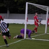 Jack Pettett is the goalscorer as Peacehaven and Telscombe take the lead at Egham | Picture: Stanley Bernard