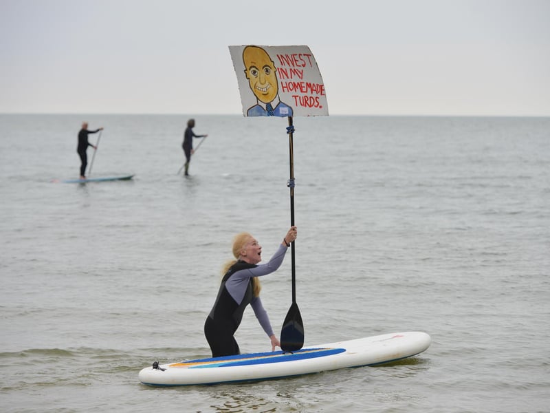 Surfers Against Sewage Paddle-Out protest in Hastings on May 18 2024.