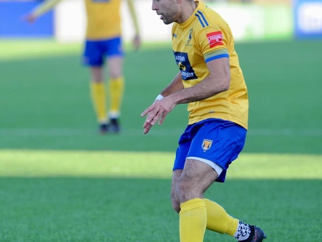 Action from Lancing's 3-2 win over Ashford United on Saturday. Picture by Stephen Goodger