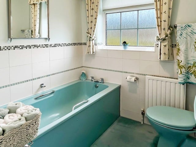 This three-bedroom, detached house with a stunning south-facing garden has come on the market with Graham Butt priced at £695,000