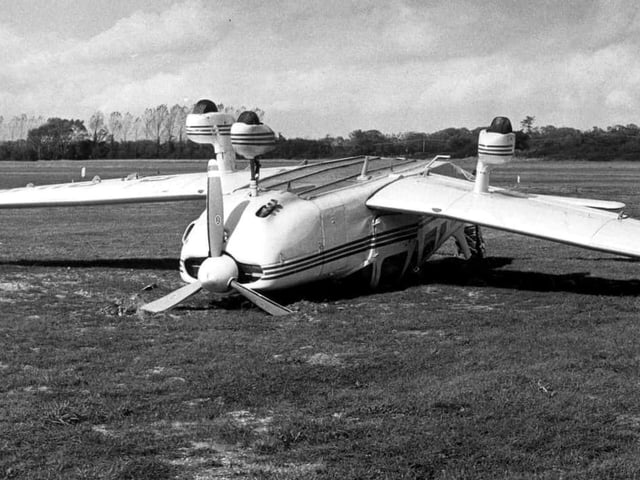 An overturned plane at Goodwood Airfield