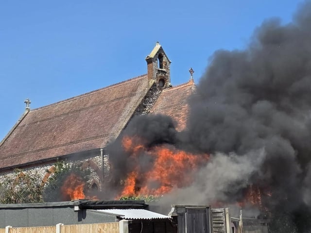 Firefighters tackle a blaze that destroyed two sheds, on Beaconsfield Road