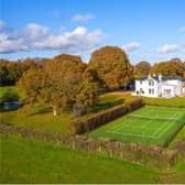 Old Park, Rusper, is a beautiful five-bedroom property with landscaped grounds featuring a hard tennis court. It is on sale through agents Savills with a guide price of £2,350,000.