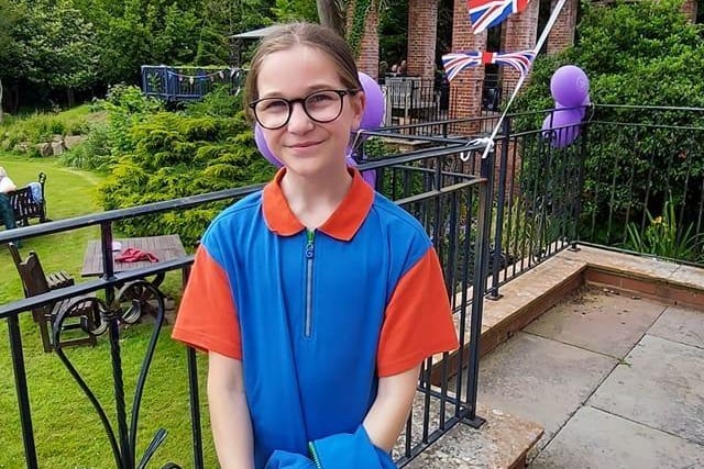 Kirsten Campbell's daughter as part of the Guides group, helped serve tea to residents of Sussex Down Care Home in Storrington on Friday