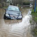 Car stuck in floodwater in Bognor Regis.