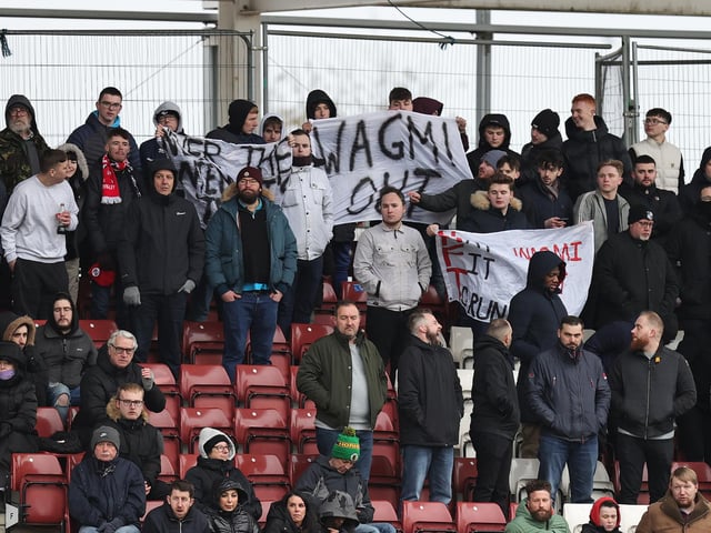 Crawley Town fans protest against they owners of the Club during the Sky Bet League Two between Northampton Town and Crawley Town at Sixfields on March 04, 2023 in Northampton, England. (Photo by Pete Norton/Getty Images)