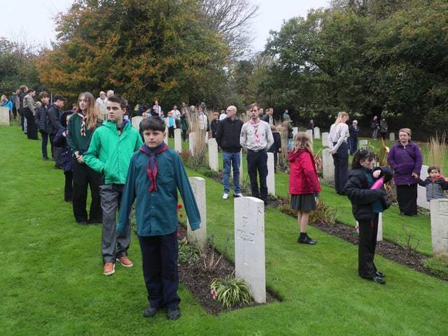 Planting of the crosses ceremony of remembrance at the Commonwealth war graves at Hastings cemetery. Photo by Roberts Photographic.