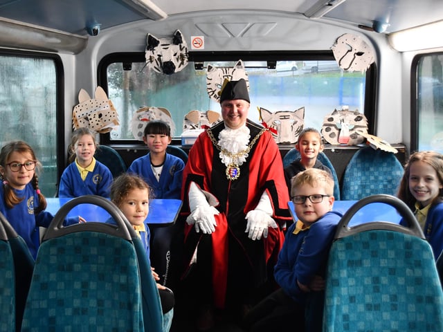The bus is fitted with tables to facilitate a creative space