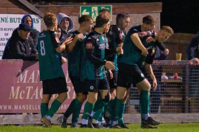 Burgess Hill Town celebrat Dan Perry's goal against Sevenoaks - which proved the only one of the game | Picture: Chris Neal