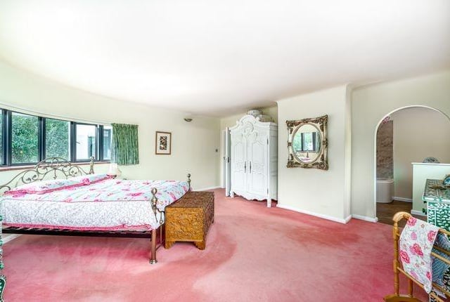 One of the bedrooms benefits from a balcony.