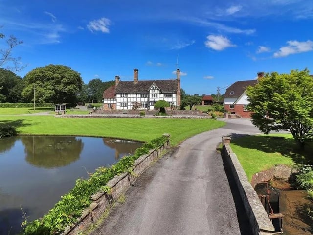 The farmhouse is set well back from the road with a picturesque approach from East Mascalls Lane via a tree-lined private drive