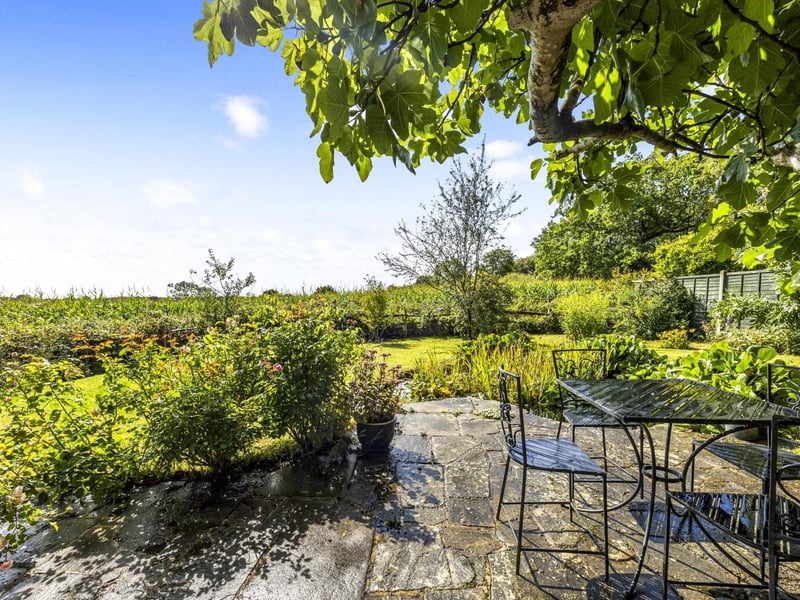 The home has far-reaching views across the fields to Chailey Green and St Peter’s Church. Photo: Yopa