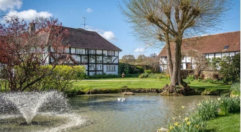 In pictures: 12-bedroom Sussex house with two swimming pools, spa, tennis court and world-class equestrian facilities