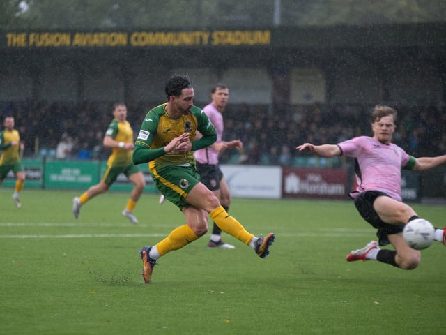 Horsham FC edged out Walton & Hersham 1-0 on a wet and windy afternoon at the Fusion Aviation Community Stadium