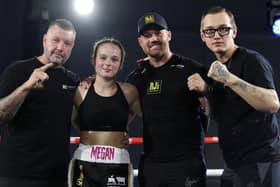 Megan Payne and her team celebrate her pro debut victory | Picture: Costakis Evangelou