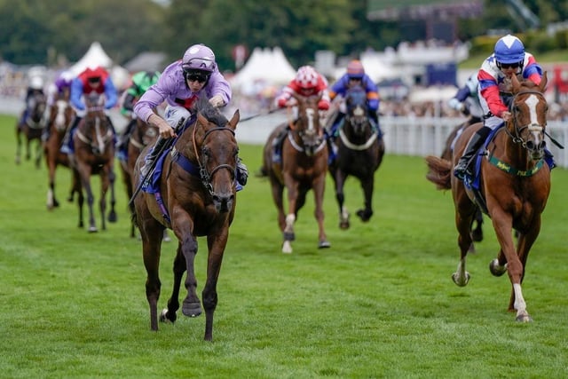 CHICHESTER, ENGLAND - AUGUST 04: Luke Morris riding Temporize (lilac) win The Coral Goodwood Handicap at Goodwood Racecourse on August 04, 2023 in Chichester, England. (Photo by Alan Crowhurst/Getty Images):Action from Friday's racing at Glorious Goodwood 2023