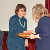 Vicci Johnson, Joint Chair, Greening Steyning receives the Bowl from Lady Emma Barnard