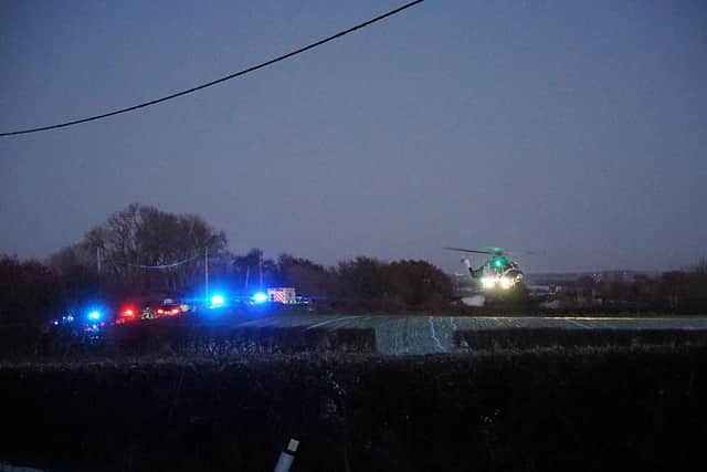 Emergency service vehicles by the collision near Hooe