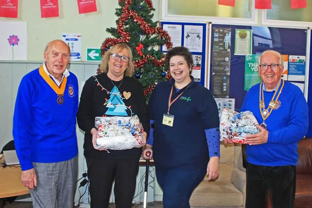 Littlehampton Rotarians Bruce Green and Keith Green with Morrisons community champion Alison Whitburn and Sam Gouldson, deputy manager at Littlehampton & District Foodbank