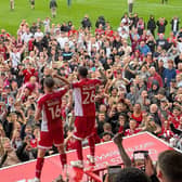 Crawley Town skipper Jay Williams leads the celebrations after the game | Picture: CTFC
