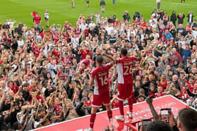 Crawley Town skipper Jay Williams leads the celebrations after the game | Picture: CTFC