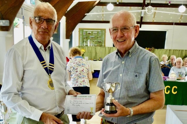 Jim Gray receiving the Dahlia Cup. Picture: Ferring Gardening Club