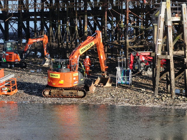 With full repair works unable to start until mid-November, the council is 'having an interim repair done' to help the remaining piles to support the weight of the pier.