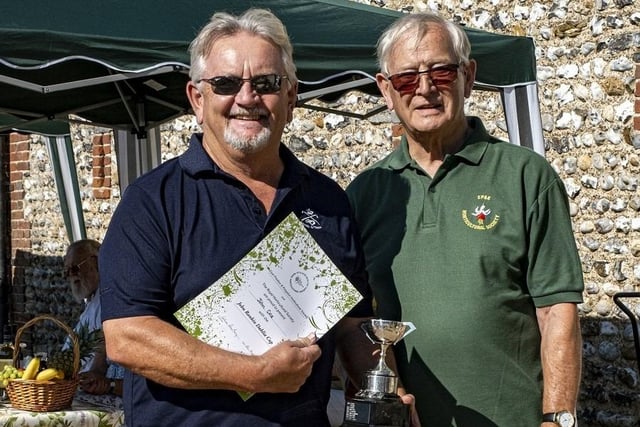 John Cole receives the John Rankin Dahlia Cup from Colin Crane at East Preston and Kingston Horticultural Society flower show