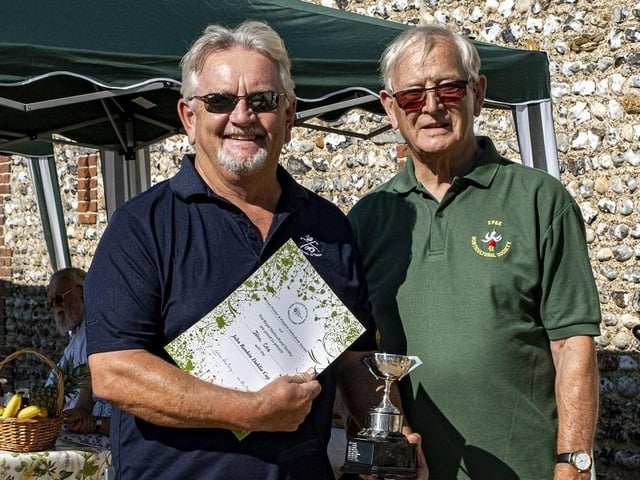 John Cole receives the John Rankin Dahlia Cup from Colin Crane at East Preston and Kingston Horticultural Society flower show