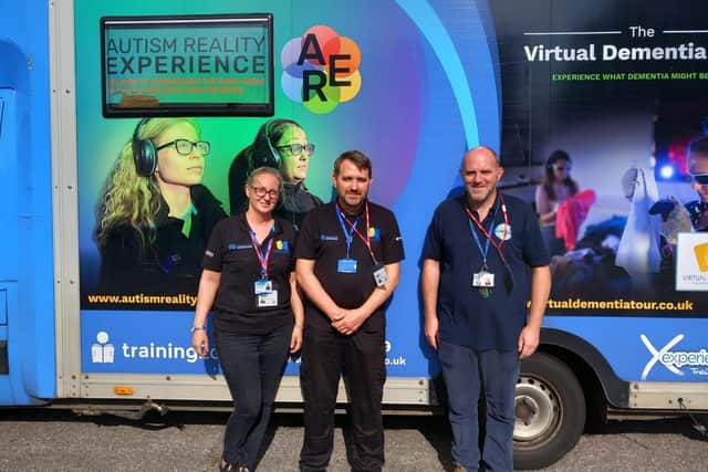 Autism Reality Experience Bus - Trainers and Deputy Youth Service Manager Joel Cottingham (right)