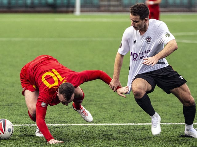 Action from Newhaven v Horsham YMCA at Fort Road in the SCFL premier
