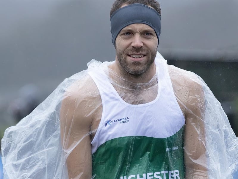 A member of the Chichester Runners comes prepared for the weather - which in fact was bette than many feared