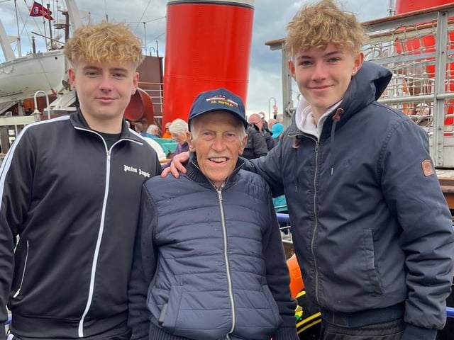 Mr Butchers, with his grandchildren, on board PS Waverley