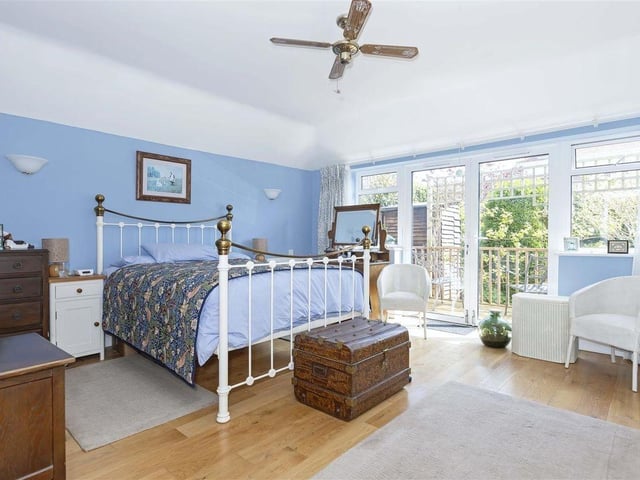 This end-of-terrace, five-bedroom property is on a corner plot in Grand Avenue, just a short walk from the town centre and yards from the beach. It has come on the market with Robert Luff & Co priced at £850,000.