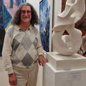 Terry Merritt with his sculpture Volute at the London Art Biennale 2023