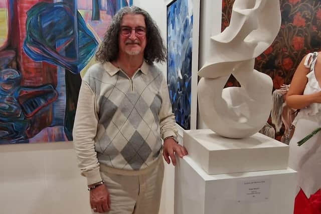 Terry Merritt with his sculpture Volute at the London Art Biennale 2023