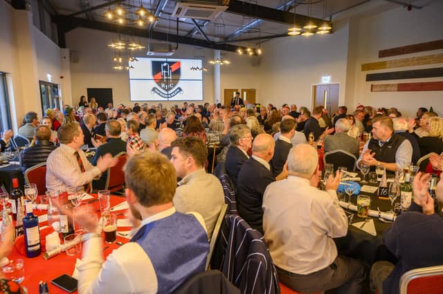 Crowds pack into the Haywards Heath RFC clubhouse for the first time
