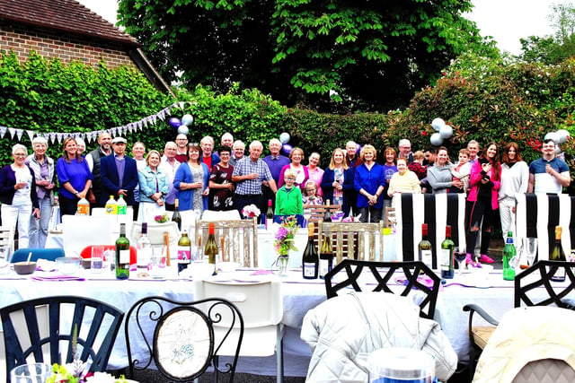 Revellers in The Droveway, Haywards Heath, celebrating Her Majesty the Queen's Platinum Jubilee Event on Sunday, June 5