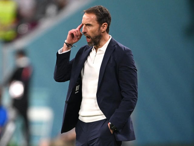DOHA, QATAR - NOVEMBER 21: Gareth Southgate, Head Coach of England, gives their team instructions during the FIFA World Cup Qatar 2022 Group B match between England and IR Iran at Khalifa International Stadium on November 21, 2022 in Doha, Qatar. (Photo by Matthias Hangst/Getty Images)