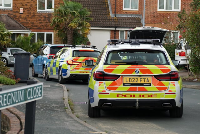 A driver failed to stop after a collision with a police car in Eastbourne, resulting in a large-scale search