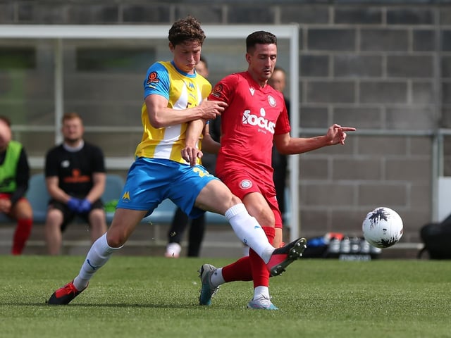 Action from Worthing's 3-0 win at Torquay United which put them top of National League South