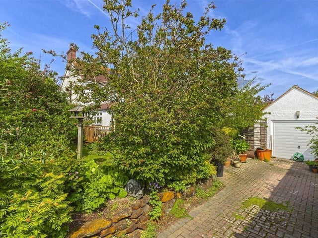This end-of-terrace, five-bedroom property is on a corner plot in Grand Avenue, just a short walk from the town centre and yards from the beach. It has come on the market with Robert Luff & Co priced at £850,000.