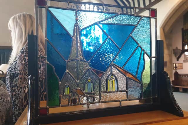 A local artist donated a staned glassed picture of St Bartholomew's Church, Horley with the finished tower and spire. Picture: Mark Dunford/SussexWorld